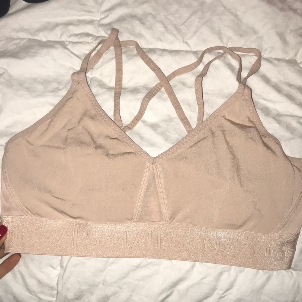 Light pink strappy sports bra